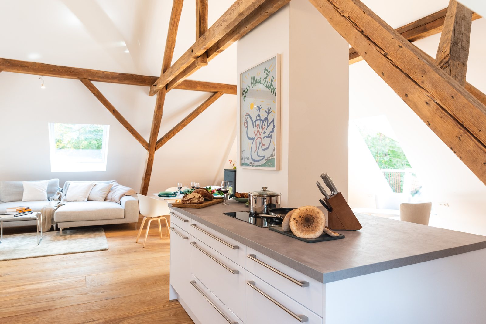 Open kitchen beneath the exposed roof timbers
