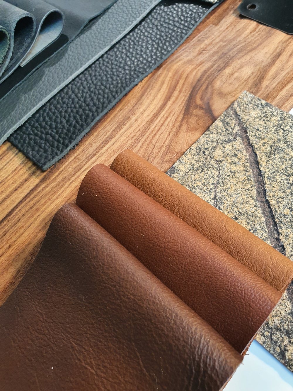 Supplementary mood board with leather tones and natural stone